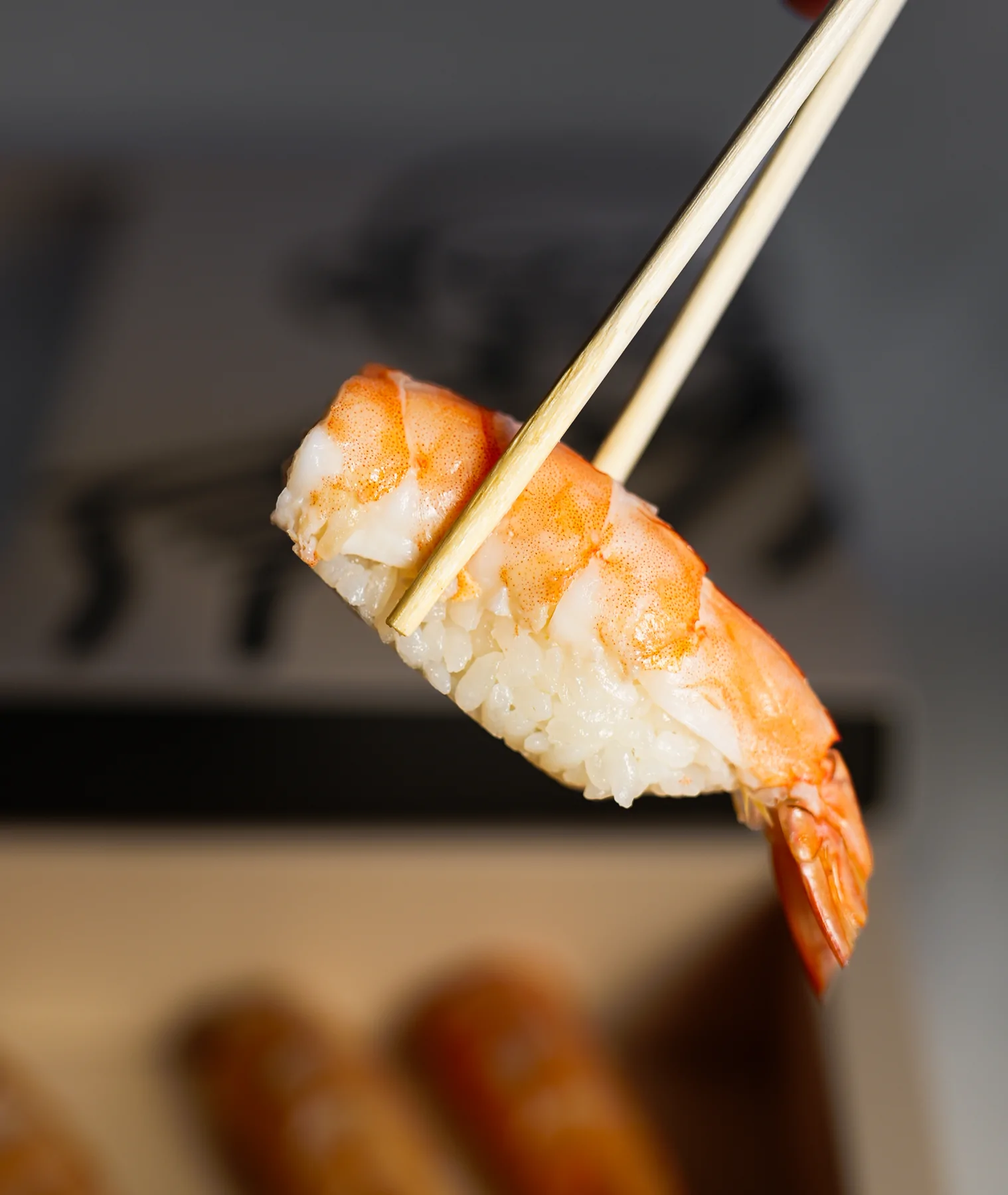 Sushi prepared with chopsticks